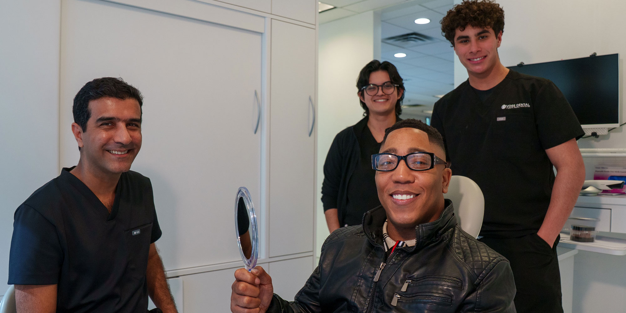 man with team and his new smile
