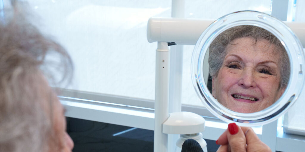 lady with new dentures