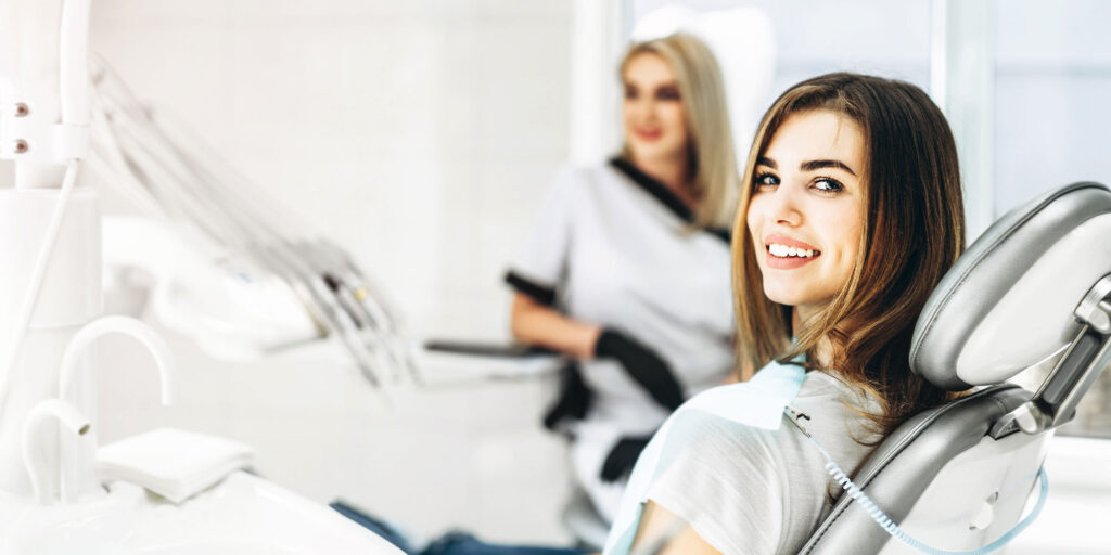 female dentist with female patient