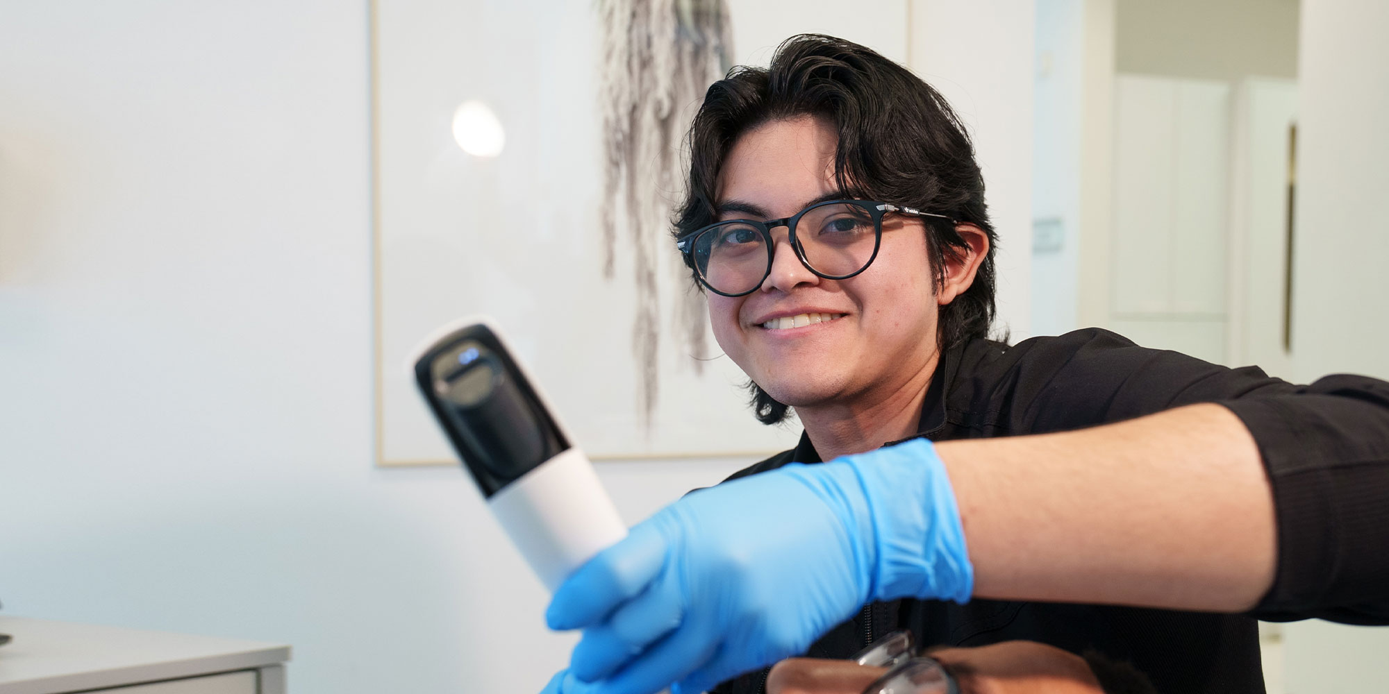 hygienist scanning mouth